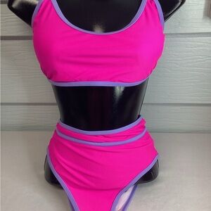 Pink and purple two piece swimsuit.